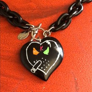 Kid Robot x Frank Kozik toggle necklace.